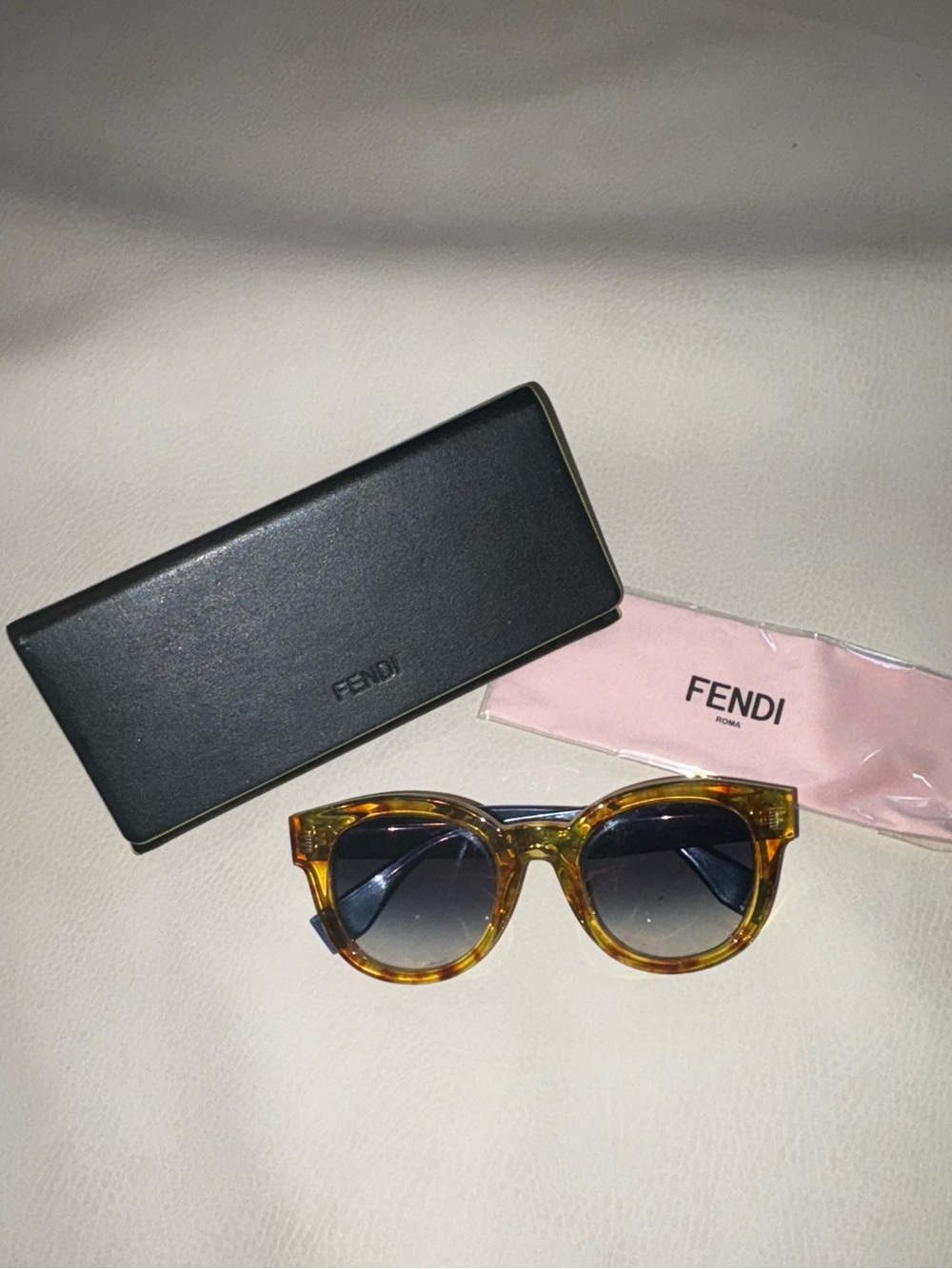 Fendi Womens Tortoiseshell Amber Frame Sunglasses with Gradient Blue Lenses
